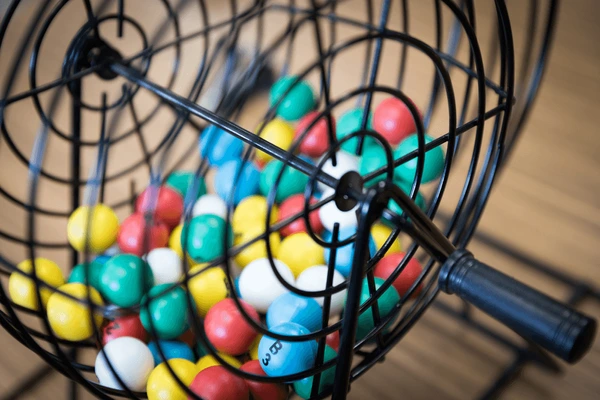 close bingo cage filled multicolored 600nw 1706712706 Bingo Night